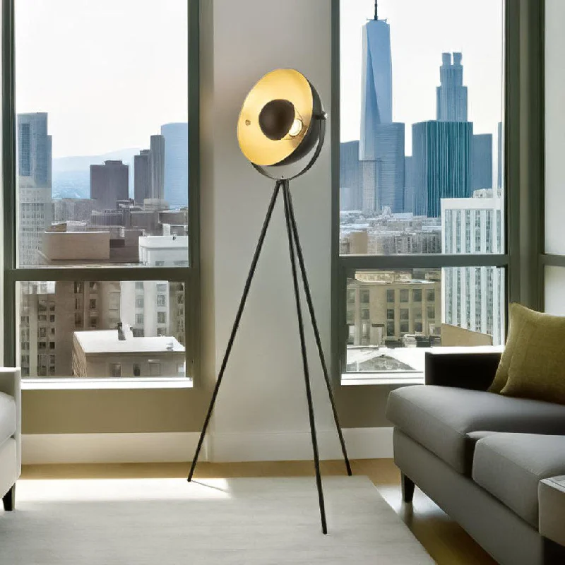 Wood Floor Lamp with Natural Grain for a Warm and Organic FeelTripod Style Floor Lamp in Gold/Black Wood Floor Lamp with Natural Grain for a Warm and Organic FeelTripod Style Floor Lamp in Gold/Black