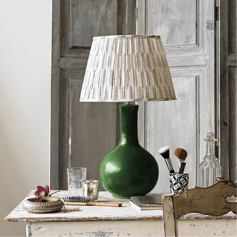 asian inspired table lamps with bamboo accents for a zen atmosphereNellie table lamp in a green glaze